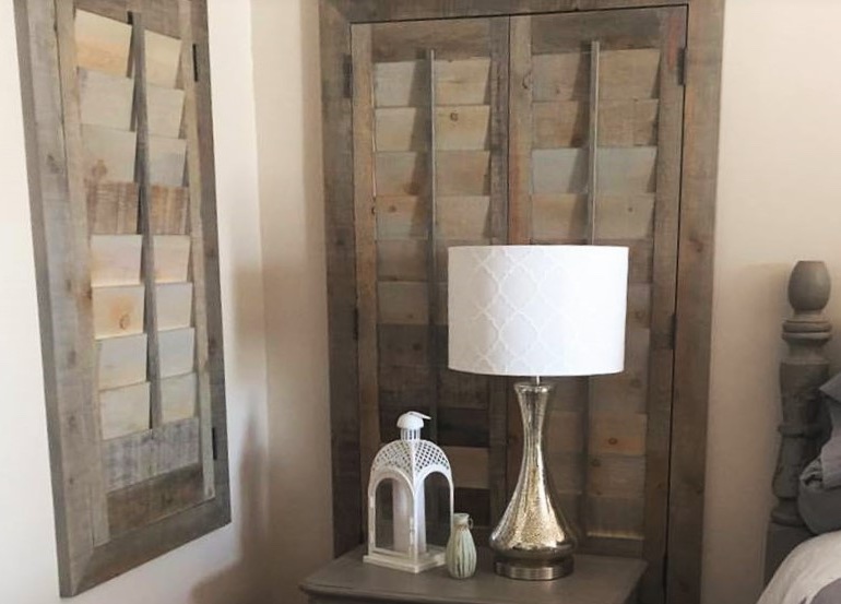 New Brunswick bedroom with reclaimed wood shutters.